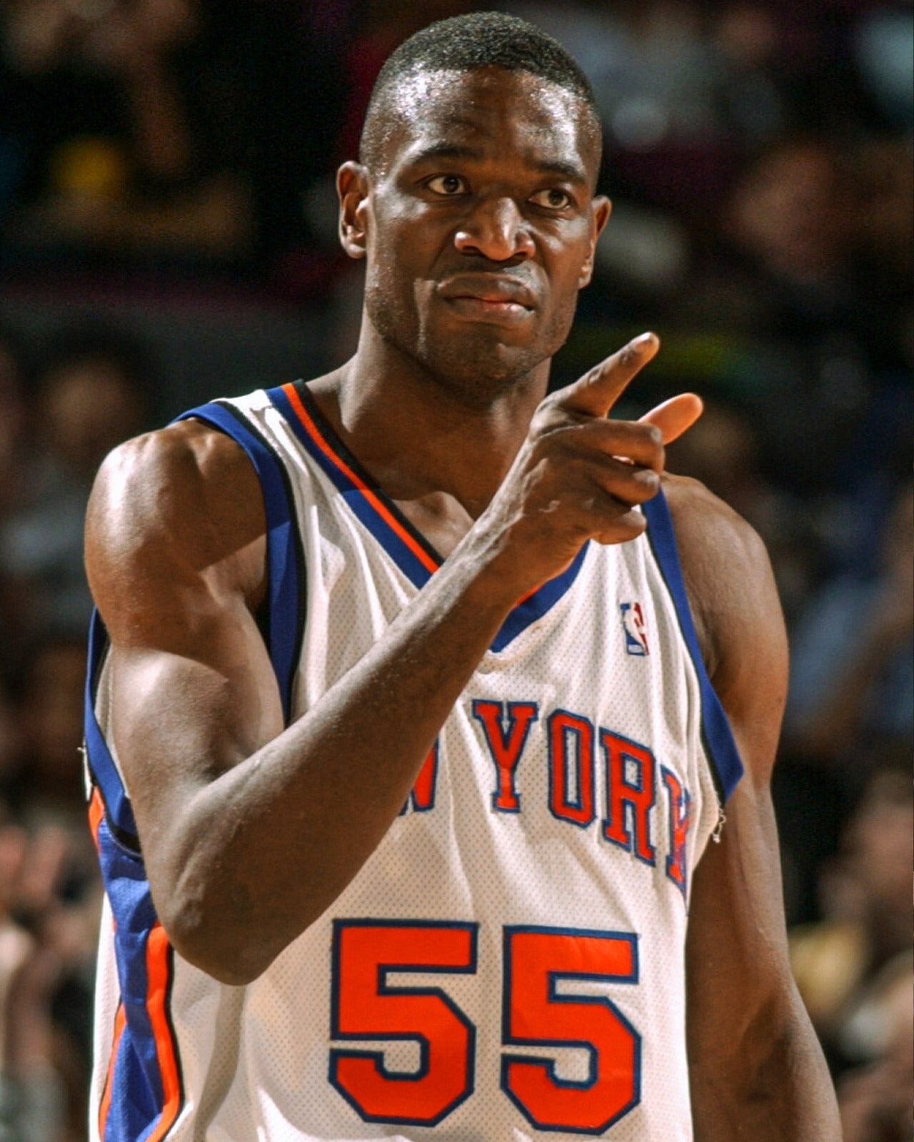 Dikembe Mutombo on court pointing gesture New York Knicks canvas wall art