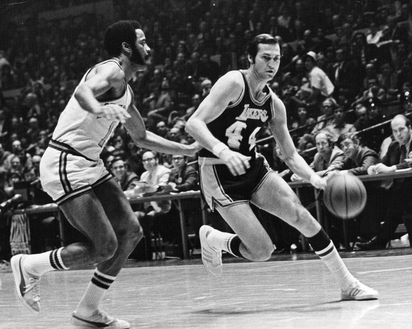 Jerry West game action black and white canvas wall art