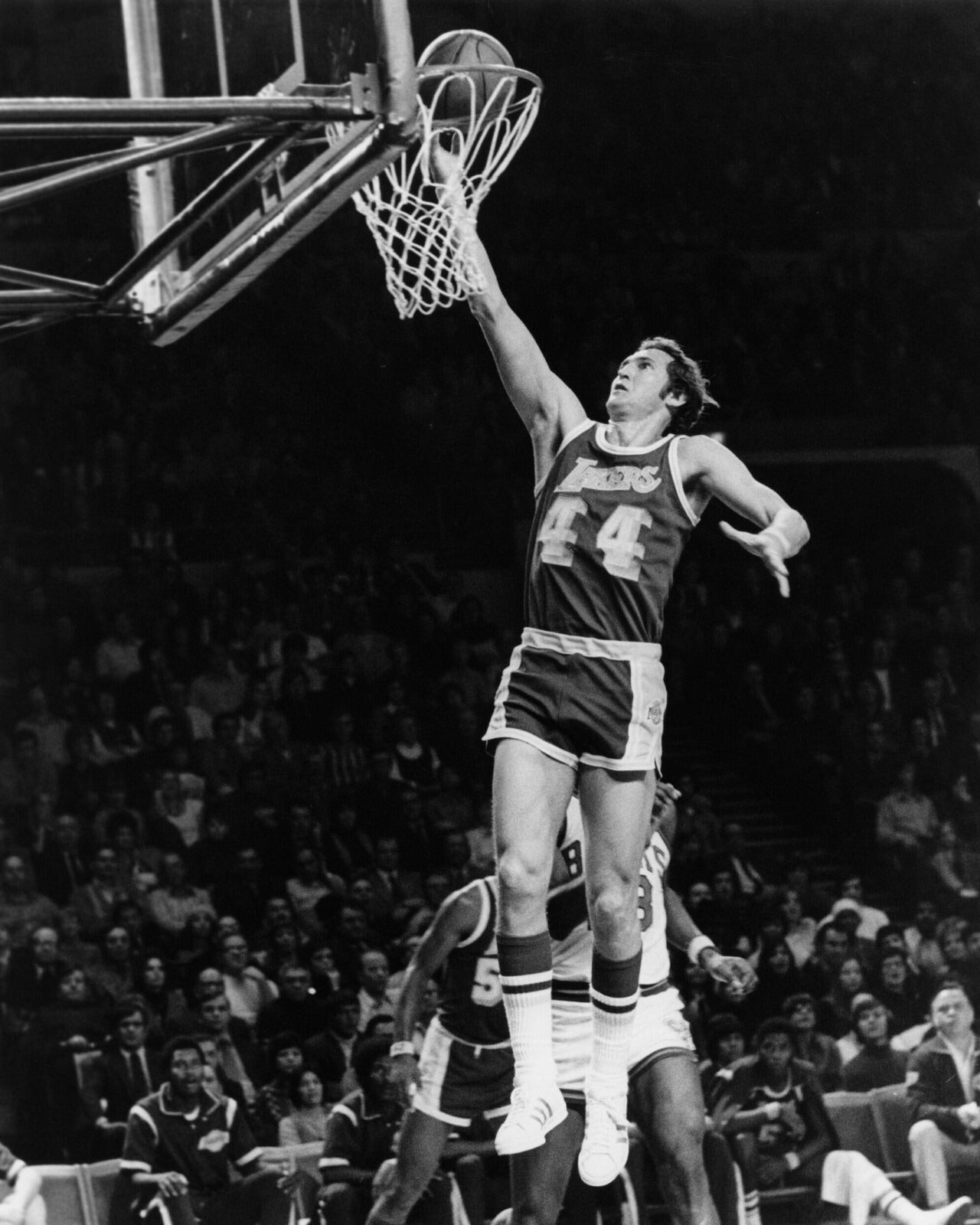 Jerry West layup jump black and white canvas wall art