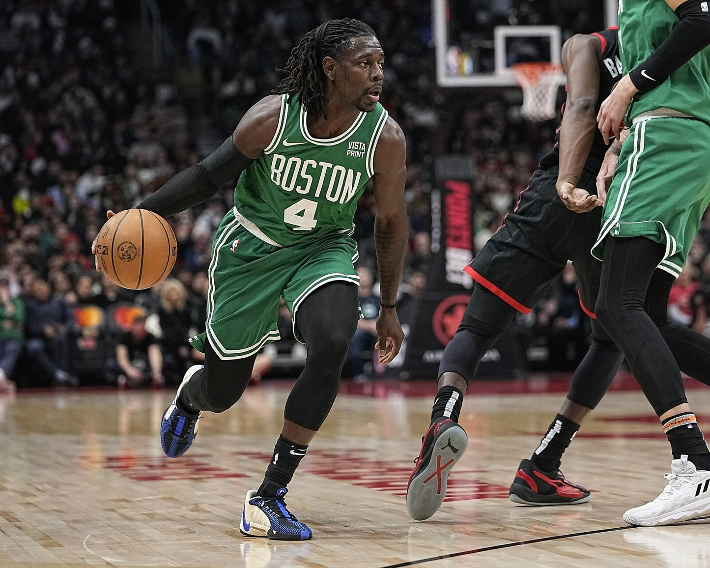 Jrue Holiday driving the net Boston Celtics canvas wall art