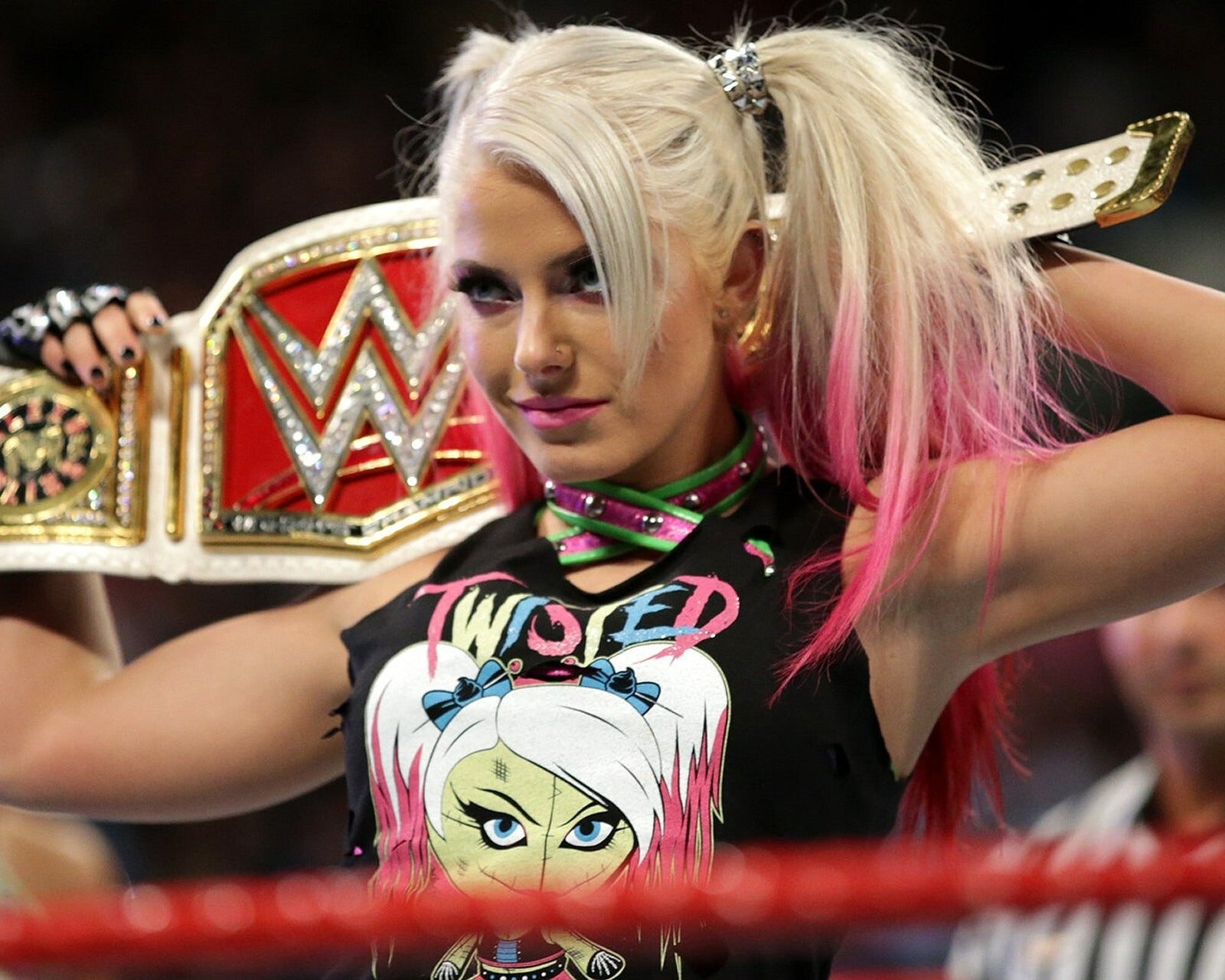 Alexa Bliss holding the championship belt in the ring canvas wall art