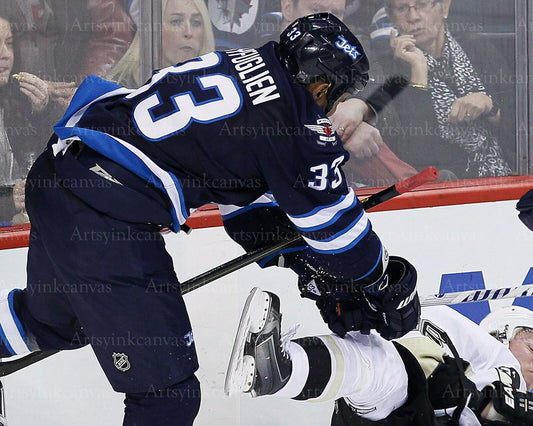 Dustin Byfuglien landing a hit Winnipeg Jets canvas wall art