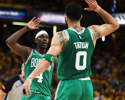 Jayson Tatum and Jrue Holiday high-five Boston Celtics canvas wall art
