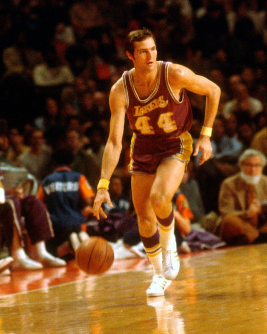 Jerry West dribbling canvas wall art