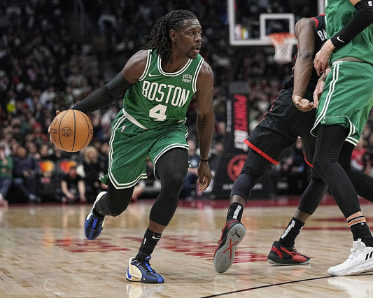 Jrue Holiday driving the net Boston Celtics canvas wall art