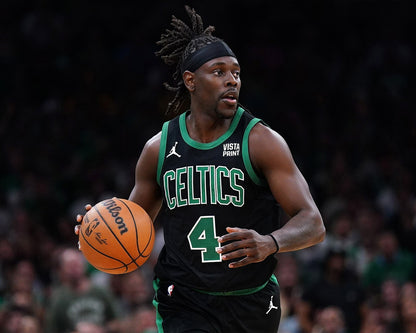 Jrue Holiday on court dribbling Boston Celtics canvas wall art