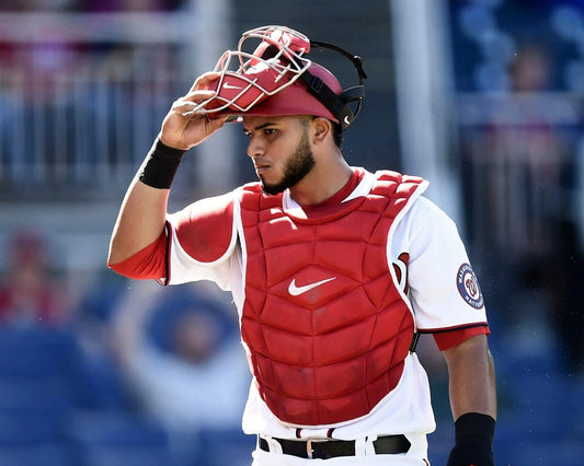Keibert Ruiz putting on catcher's mask canvas wall art