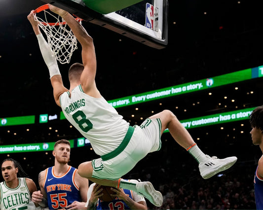 Kristaps Porziņģis hanging after a dunk Boston Celtics canvas wall art
