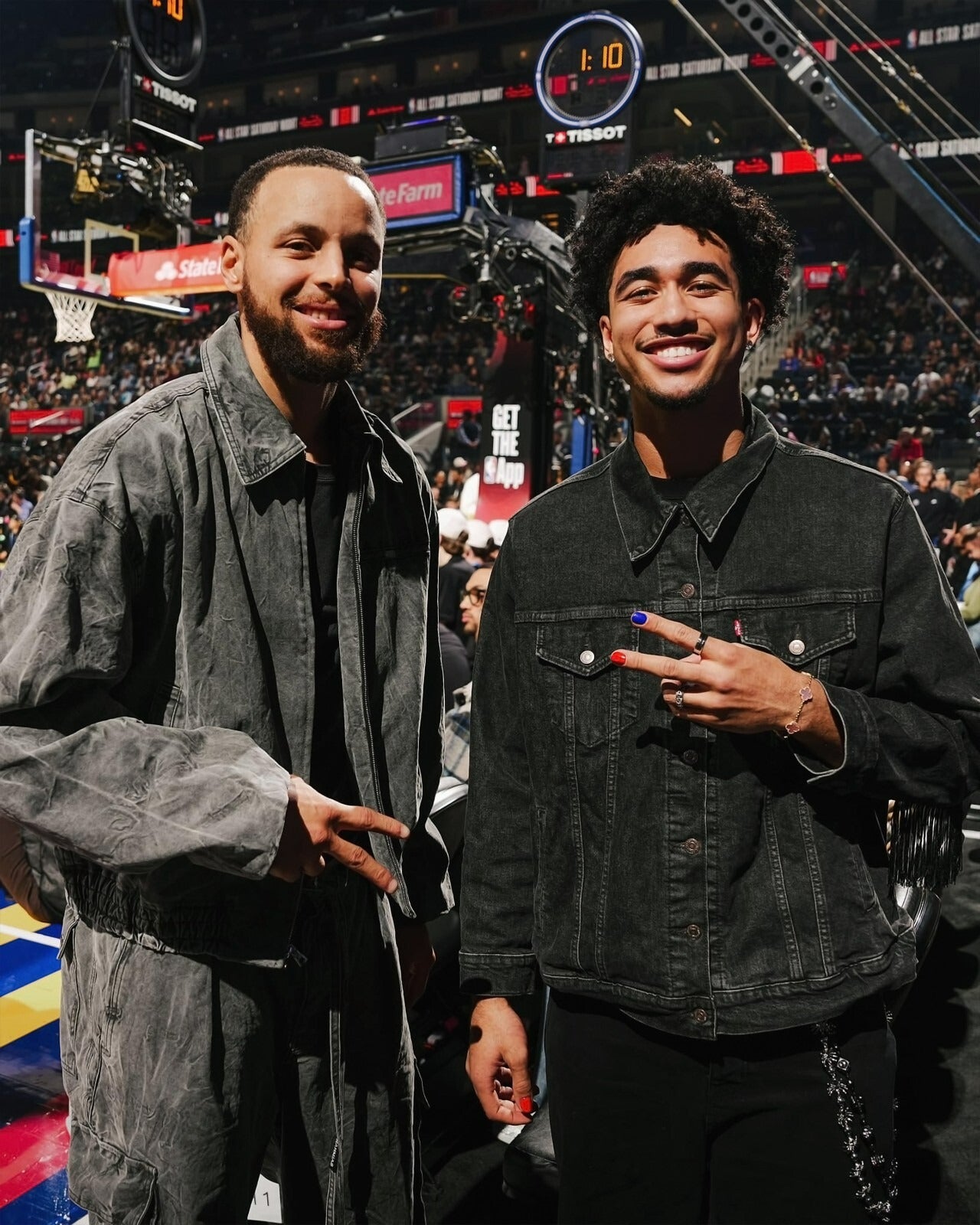 Stephen Curry and Jared McCain posing canvas wall art