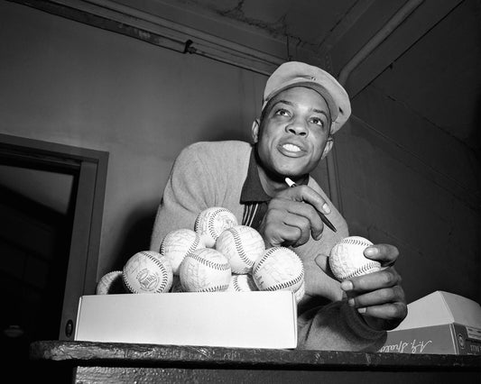 Willie Mays signing baseball canvas wall art