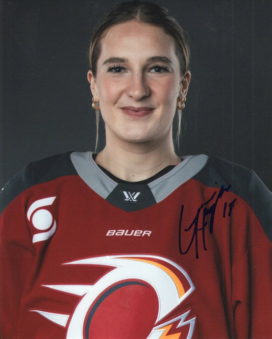 An autographed portrait of a woman wearing a red and gray Calgary Flames hockey jersey by Bauer, with a dark gray background.